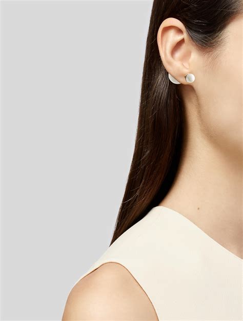 tribales dior|christian mise en Dior earrings.